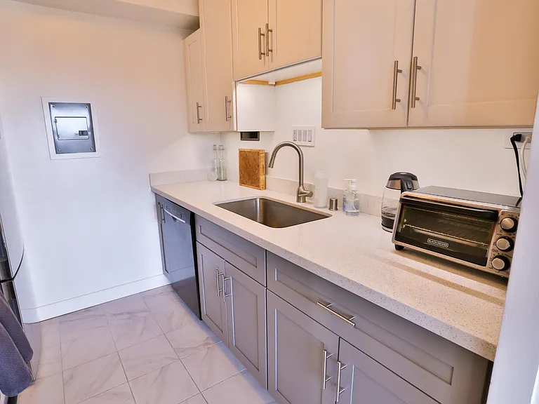 Upgraded cabinets, counters, and appliances.