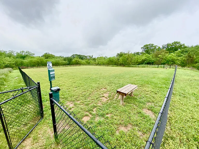 Private dog park for Cottage Park housing residents.