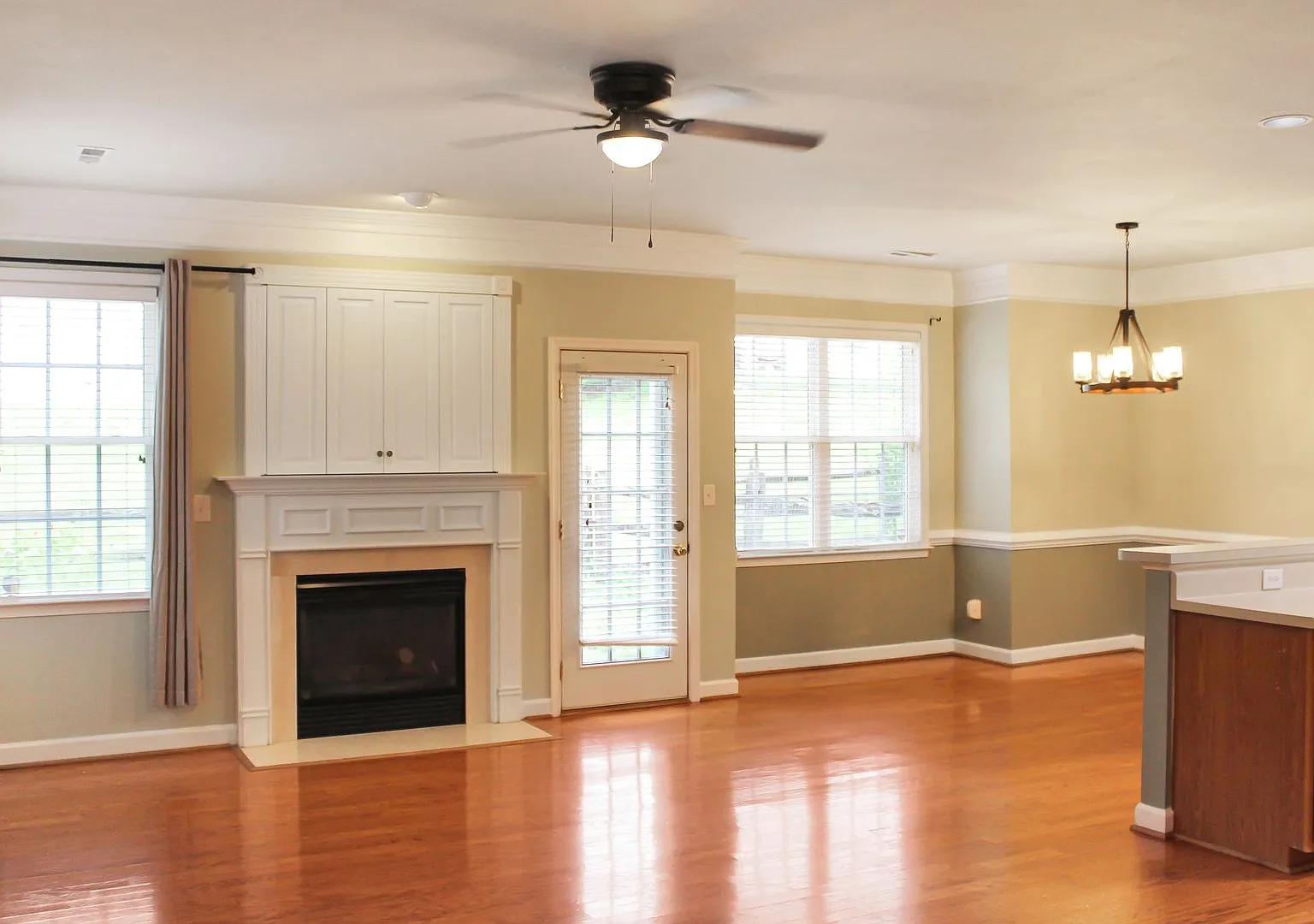 First-floor primary with fenced yard — Photo 3