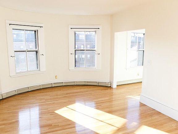 living room and walkway to kitchen