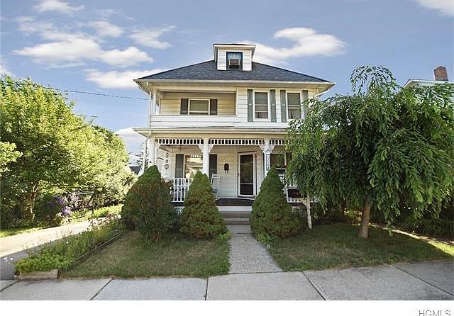 Welcome to this charm filled front porch colonial home.