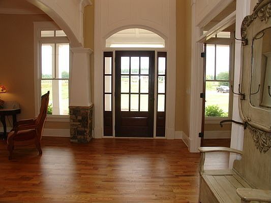 Foyer opens into Sunroom, Library and Great Room