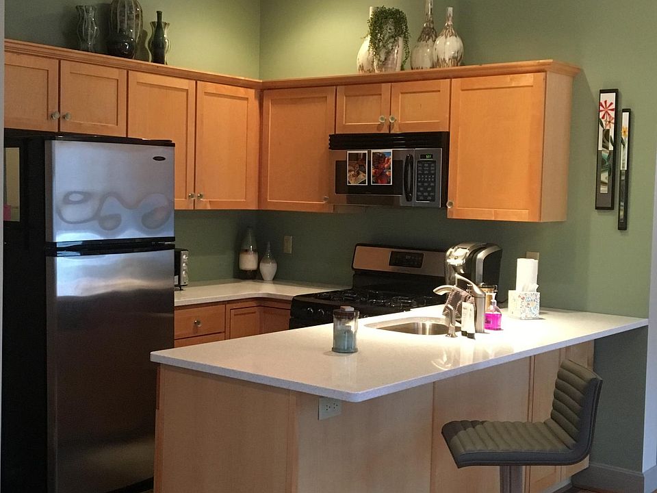 Kitchen with new solid surface counter tops and stainless ap