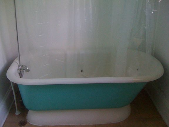 Bathroom with pedestal tub