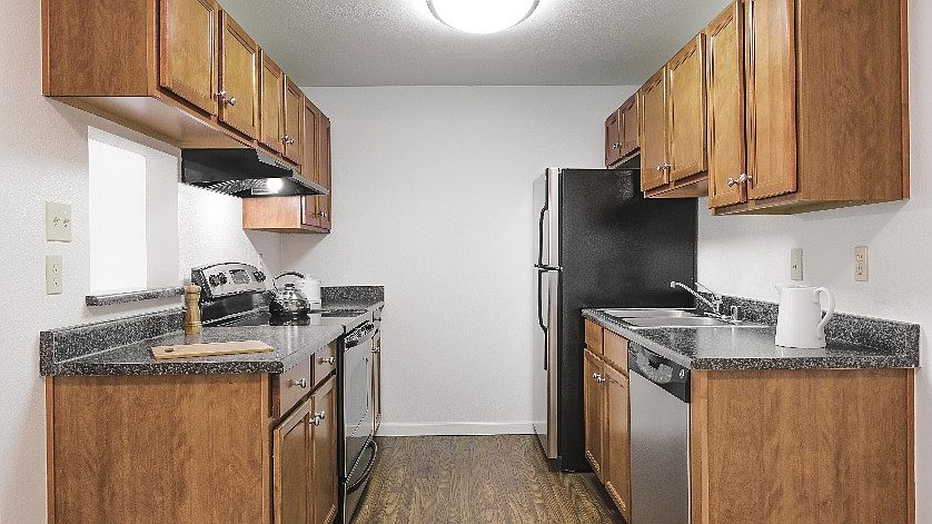 One Bedroom One Bath Sleek and Modern Black Kitchen Appliances
