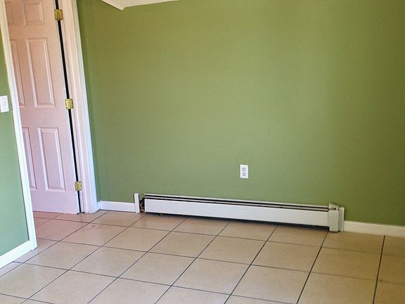 Bedroom #1 with vaulted ceiling and closet