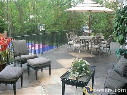 Back upper patio view overlooking pool