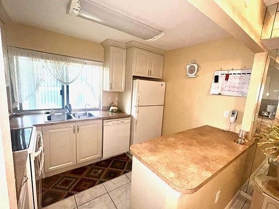 3rd image of 9400 Lime Bay Boulevard #110