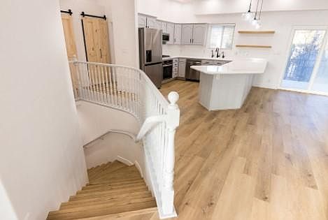 Front room view toward the kitchen/stairs