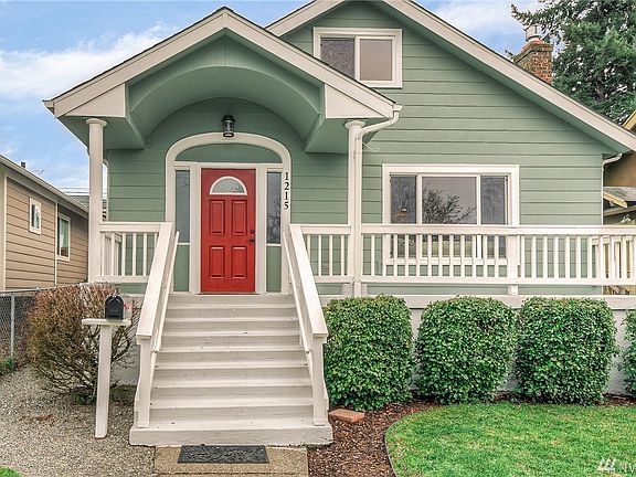The classic façade is enhanced by a partially covered front porch; perfect spot for your morning cup of coffee or afternoon lemonade.