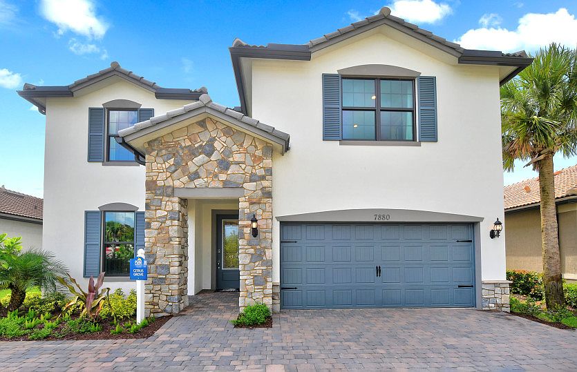 The Citrus Grove, a two-story home with a 2 car garage, shown with Home Exterior FM2A