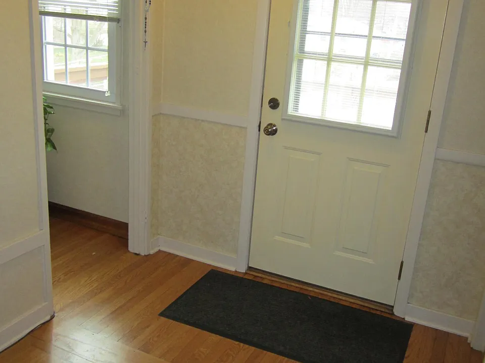 Apt entry door into smaller