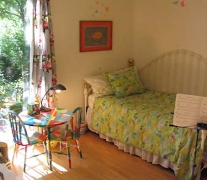 Second bedroom with sliding door to patio.