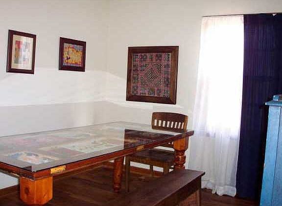 dining room with dimmer switch and linen closet