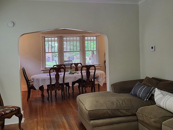 Current tenants have switched living and dining room furniture. This is dining room looking toward living room