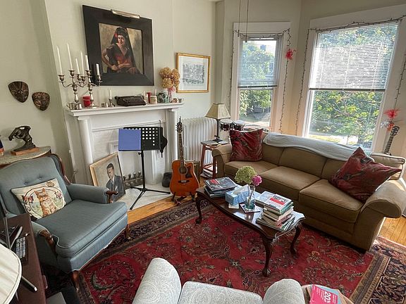 One side of the large, double space living room.