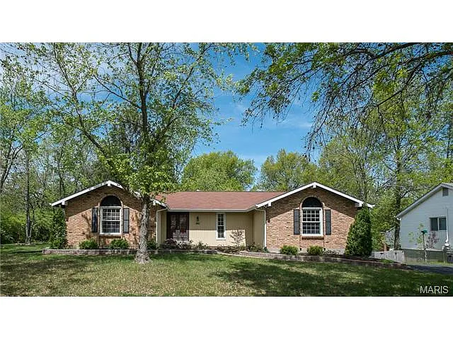 15695 Cedarmill Dr photo 1