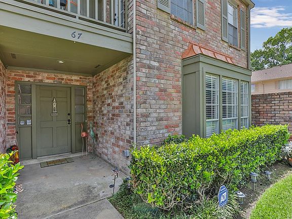 Welcoming front porch leads to your beautiful large townhome