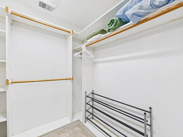 +Primary 
+Queen bed
+Reversible comforter
+Dresser 
+TV
+Walk-in closet
+Desk 
+Blackout blinds
+Bedroom door has lock
+Attached bathroom