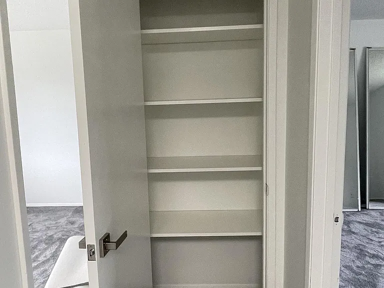 Three hallway closets provide even more storage for coats, linens, and household items.