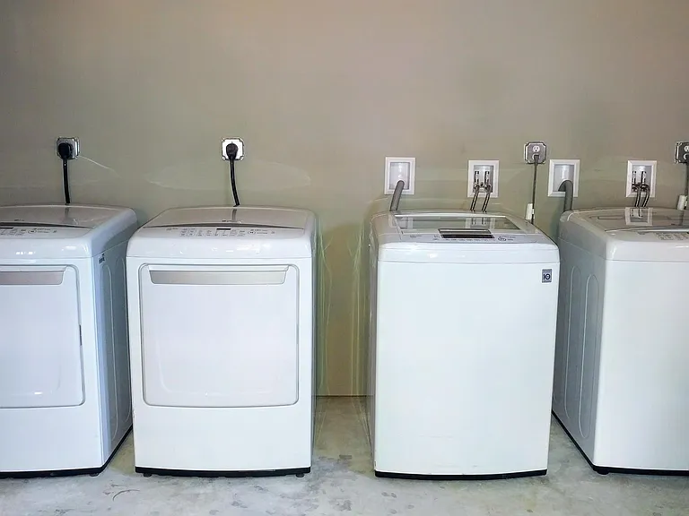 Complementary, 2 high efficiency washers and 2 dryers.