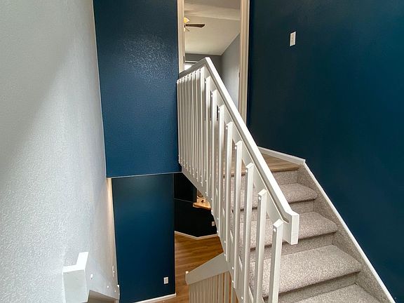 Stairs to upstairs Master Bedroom suite from Dining room.