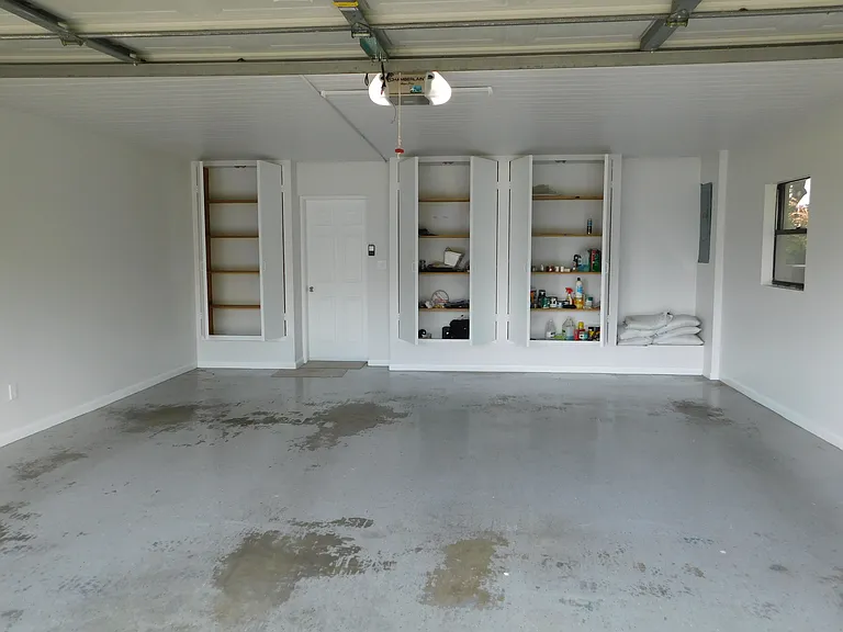 The 2-car garage has 3 closets at the end for storing whatever you need to maintain your vehicles. Since you don't need to maintain the landscaping, you free up even more space!