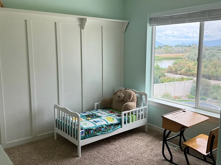 Bedroom 2 with river and mountain views.