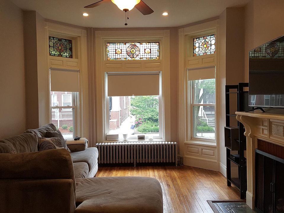 Spacious LR with gas fired fireplace, original wdwrk thruout