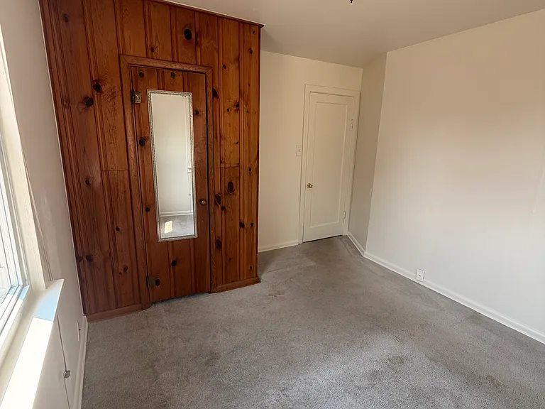 Primary Bedroom with Built In Wardrobe
