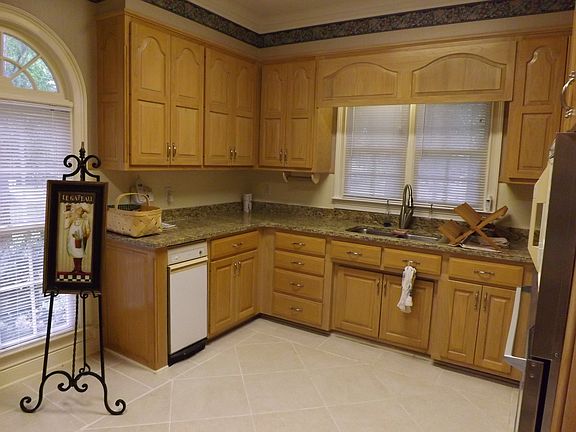 Kitchen with granite counters and custom cabinets