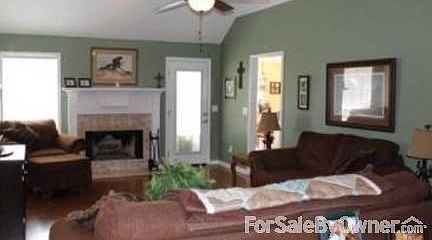 Livingroom with wood burning fireplace