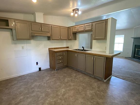 3rd image of 6938 N Rick James Dr