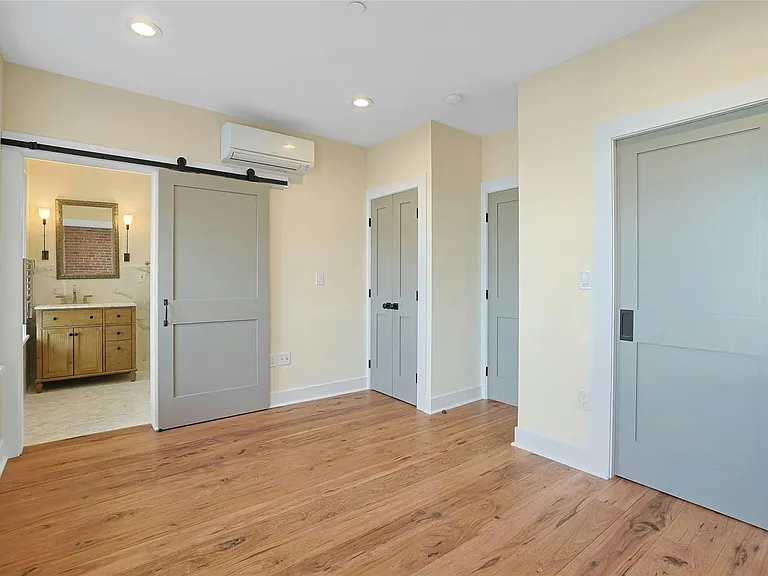 Bedroom: Light-filled bedroom with en-suite bathroom and walk in closet.