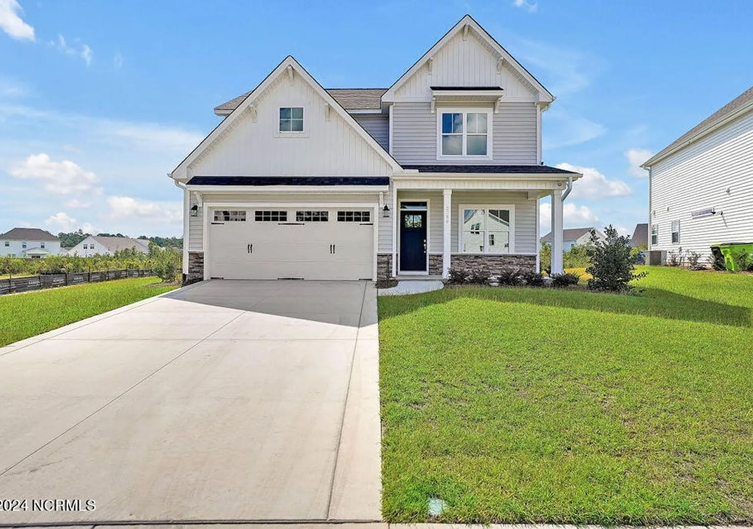 Discover this new spacious 4-bedroom, 3.5-bath home in Grayson Park — Photo 1