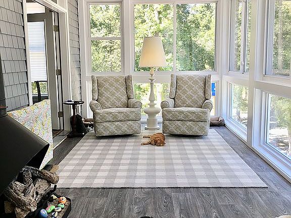 Sunroom faces the river