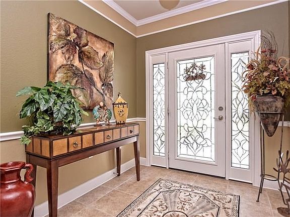 Crown molding throughout.