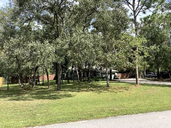 Over an Acre of Land!