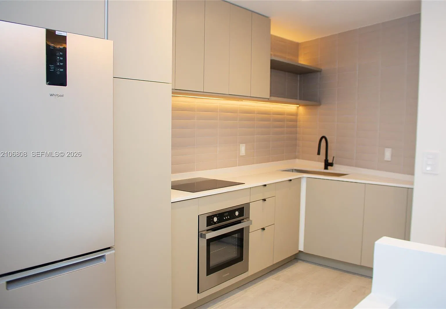 Triton Tower Condo — Photo 3
