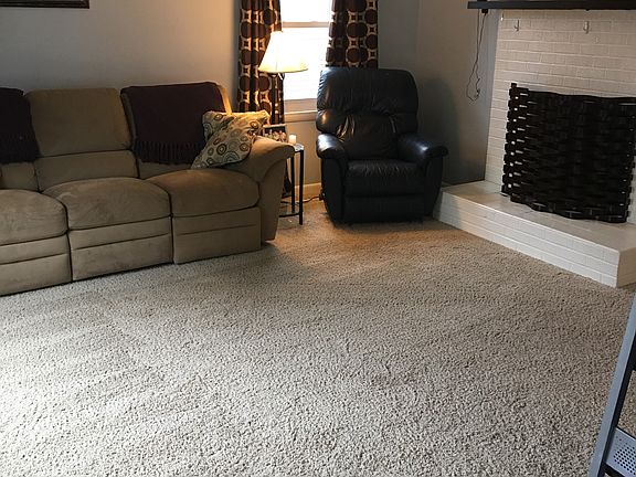 Living room with gas firepla