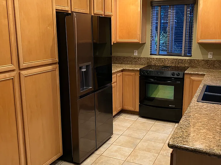 Kitchen with new stainless steel appliances
