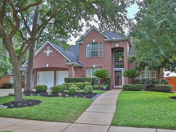 This home is built by Newmark and it's features include 4-sided brick, 3 car attached garage, may mature trees for shade and lake access.