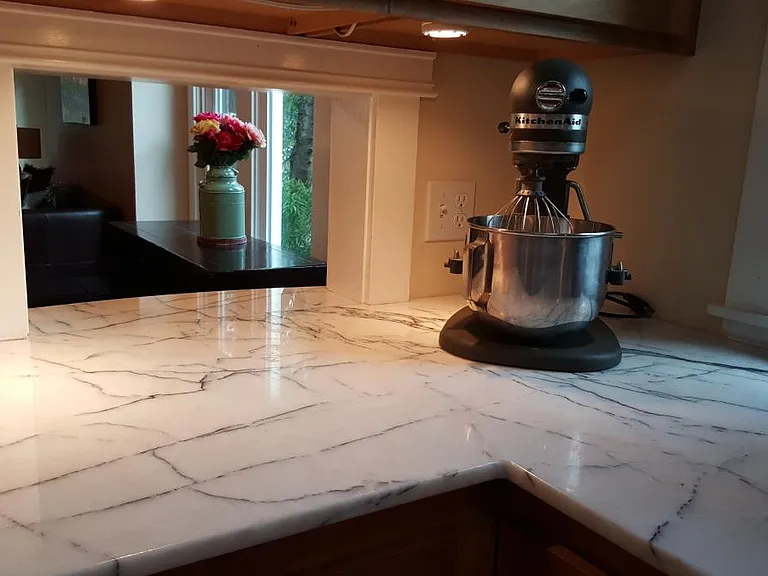 Kitchen passthrough, just one of the craftsman touches in the home.