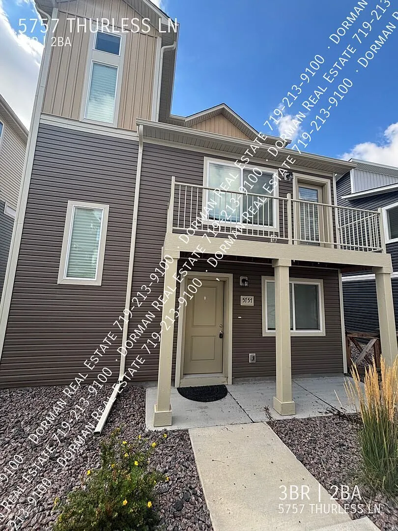 Three story home in Banning Lewis Ranch including office space, washer & dryer included — Photo 1