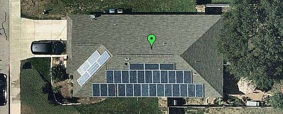 Aerial Image showing solar and large shade tree in back yard