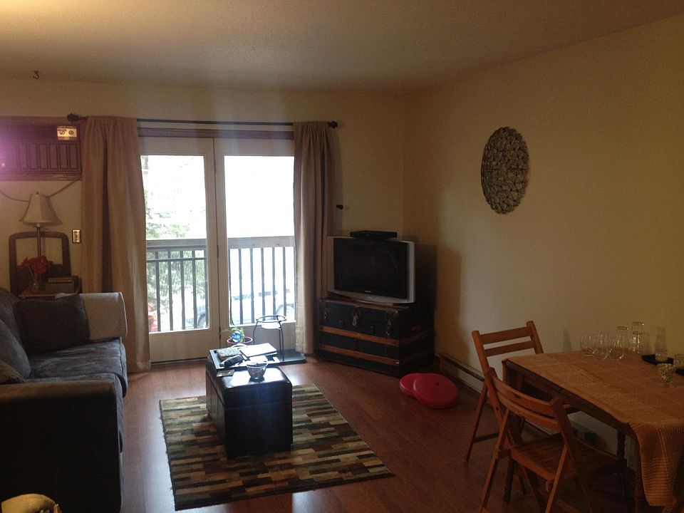 Living room with door to balcony.