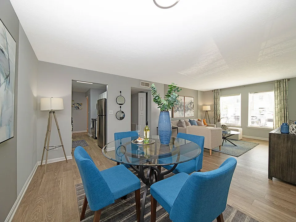 Dining area with hardwood-style flooring