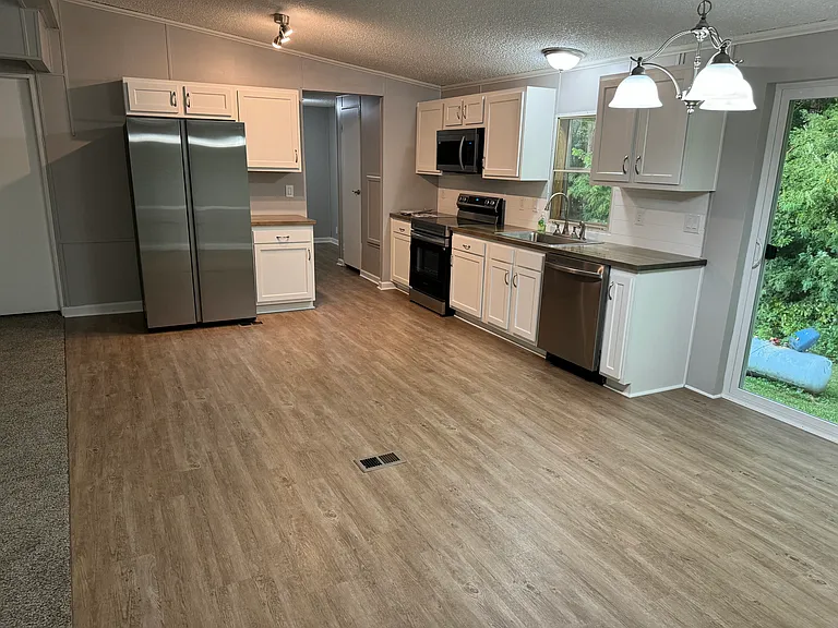 6912 Frank Ott Rd — Photo 13