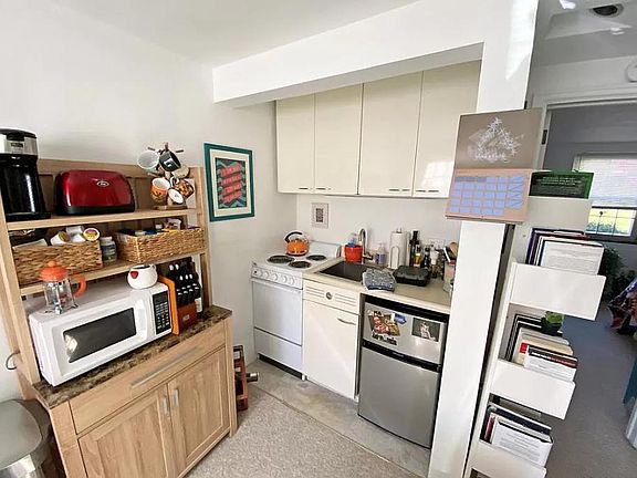 Kitchen is small, mini fridge included.