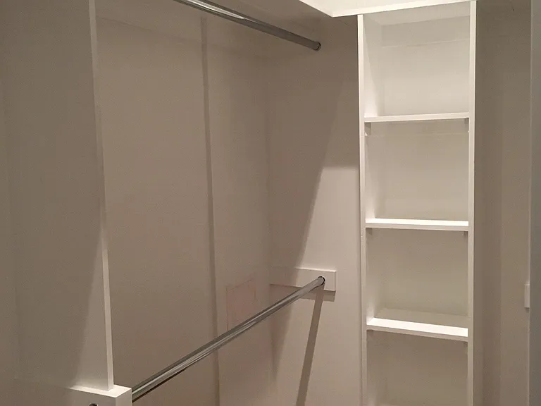 Walk-In Closet with Built-In Shelving